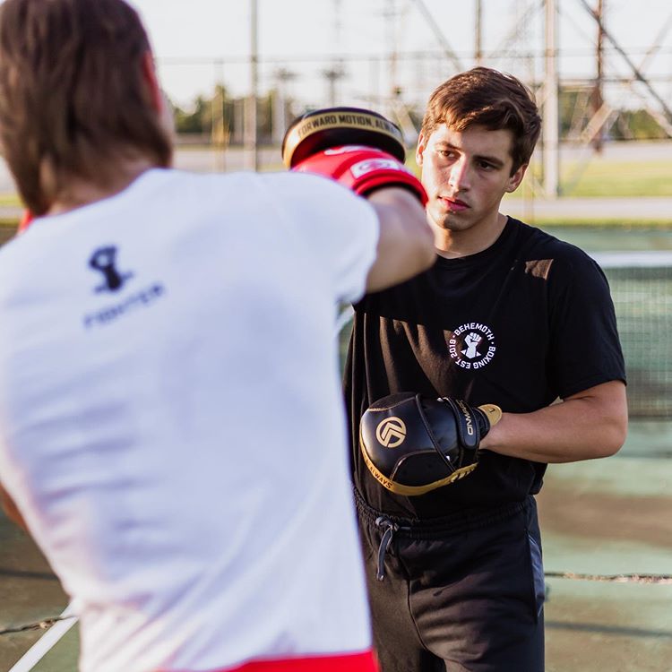 Boxers Sparring with branded t-shirts