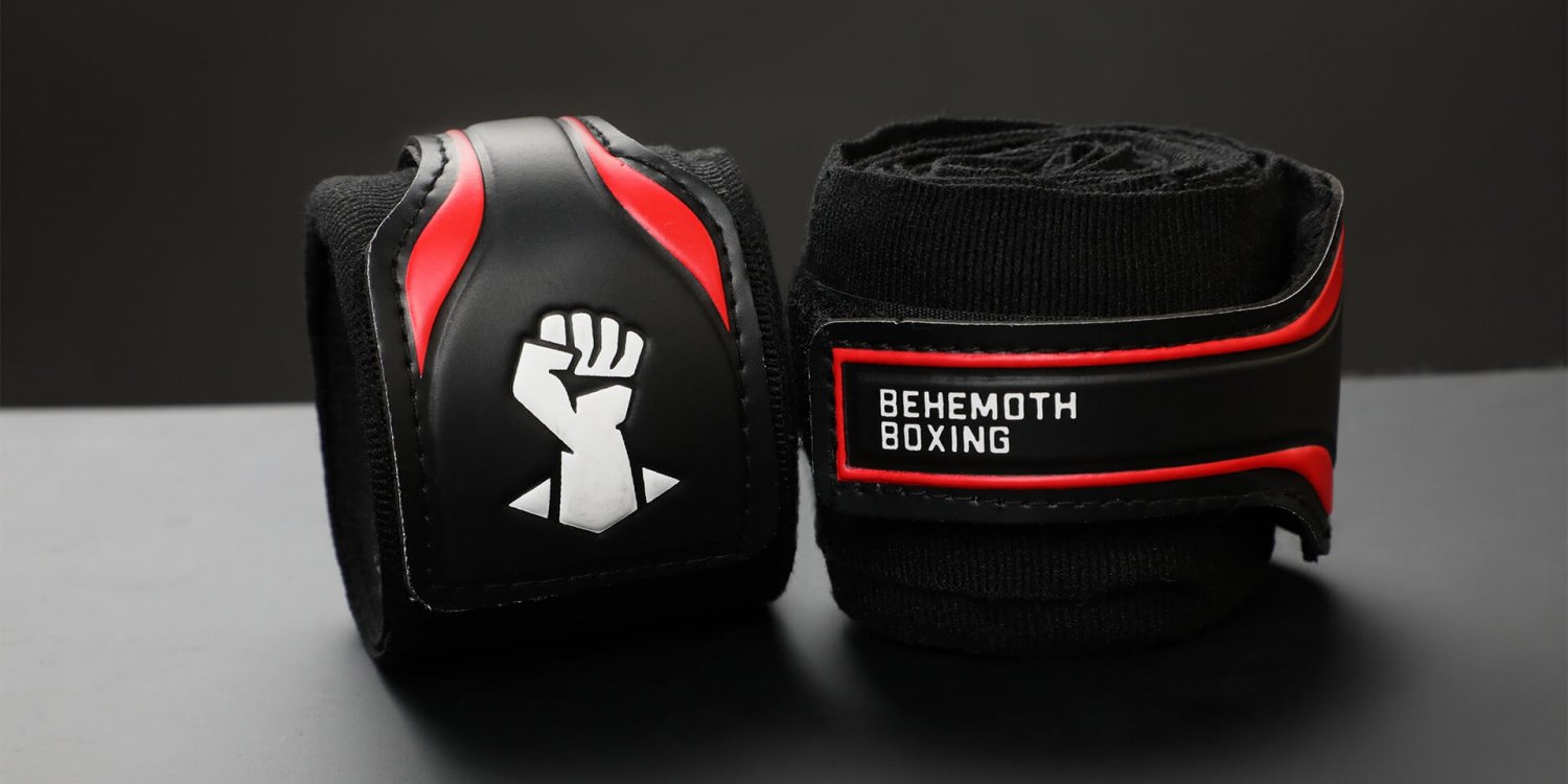 Behemoth Boxing logo design shown on black handwraps Behemoth Boxing logo design shown on black handwraps